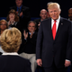 Republican presidential nominee Donald Trump (right) and Democratic presidential nominee Hillary Clinton stand in front of the audience during the second presidential debate Oct. 9, 2016, at Washington University in St. Louis.
SAUL LOEB/AFP/Getty Images